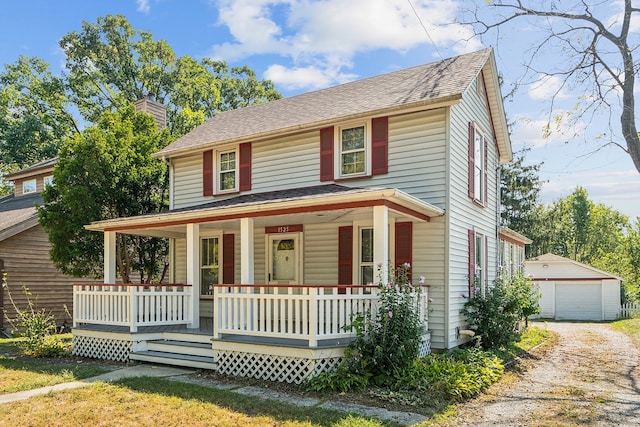 view of front of house featuring a porch, an outdoor structure, and a garage