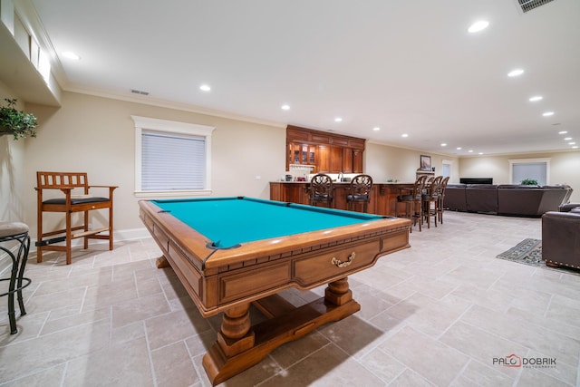 recreation room featuring crown molding, indoor bar, and pool table