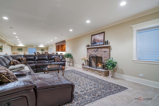 living room with a fireplace and crown molding