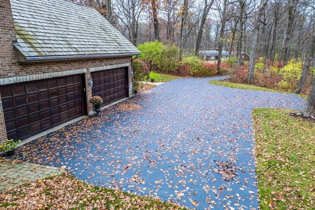 exterior space with a garage