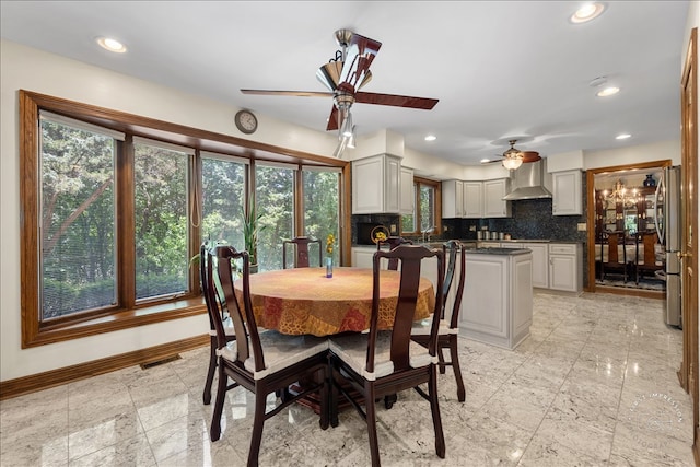 dining area with ceiling fan