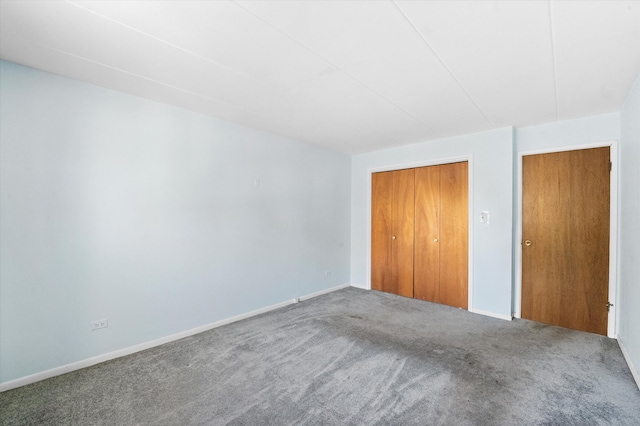 unfurnished bedroom with carpet