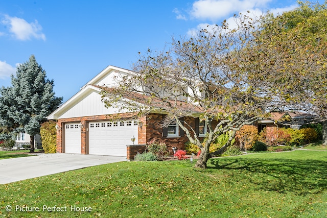 view of property with a front lawn and a garage