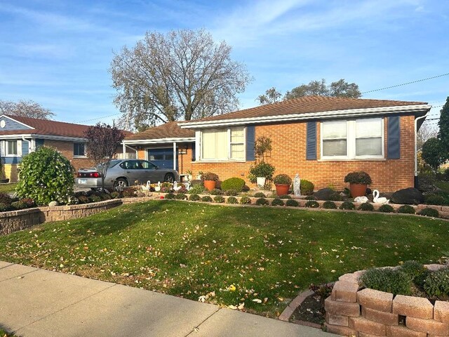 16409 Craig Dr, Oak Forest, IL 60452 - view of front facade featuring a front lawn and brick siding