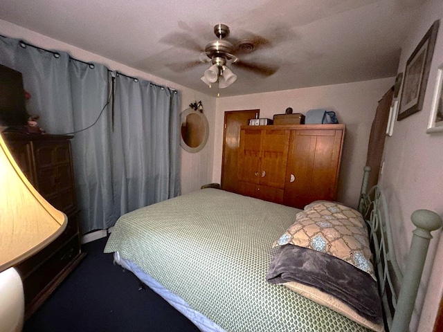 bedroom featuring ceiling fan