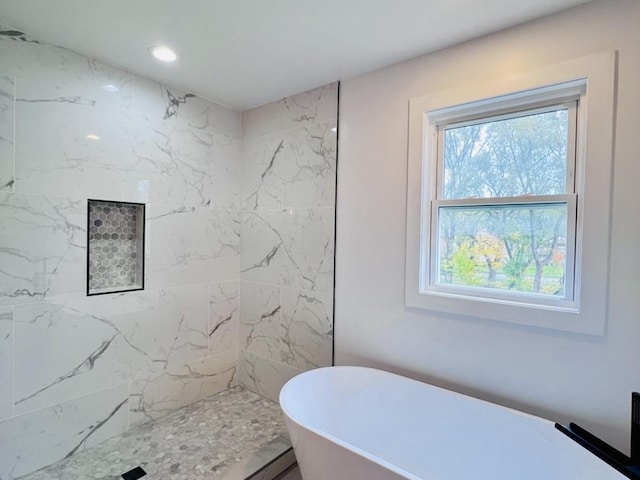 638 E 65th St, Chicago, IL 60637 - bathroom with a soaking tub, a marble finish shower, and recessed lighting