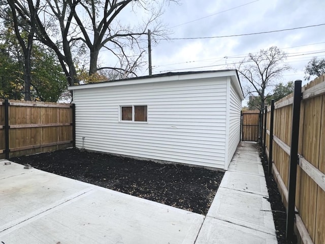 view of side of property featuring a patio