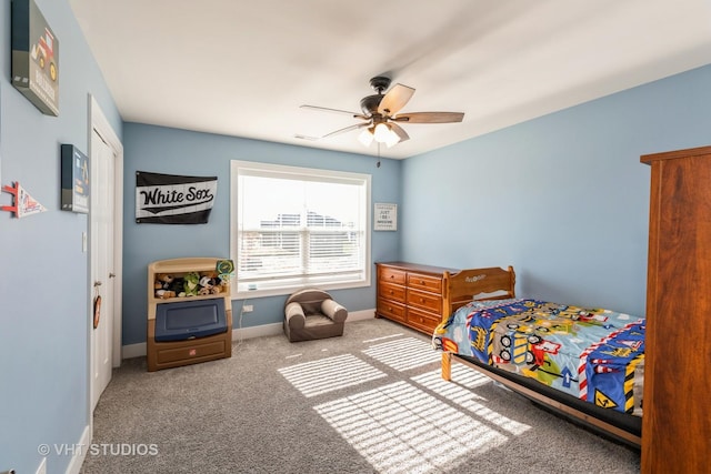 carpeted bedroom featuring ceiling fan