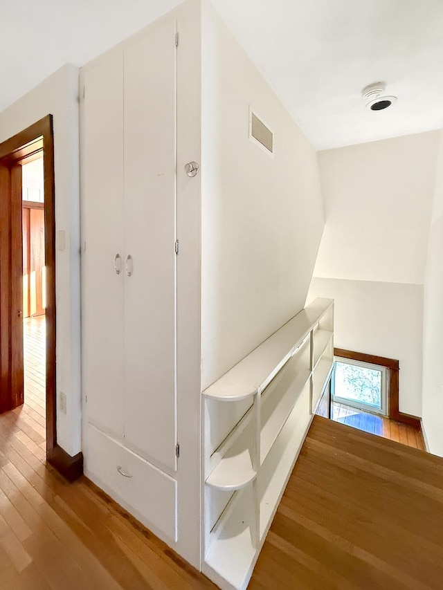 103 E Roosevelt St, Freeport, IL 61032 - hallway featuring hardwood / wood-style flooring and baseboards