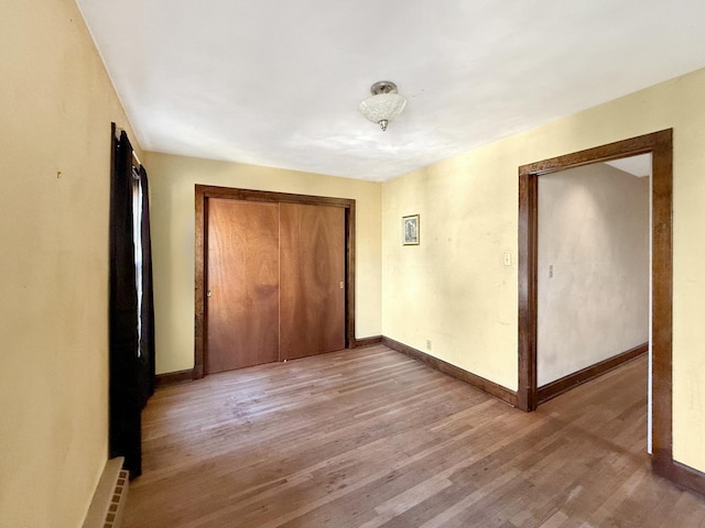 103 E Roosevelt St, Freeport, IL 61032 - hallway with wood finished floors and baseboards