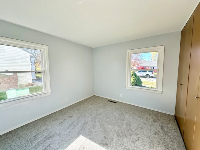 view of carpeted spare room