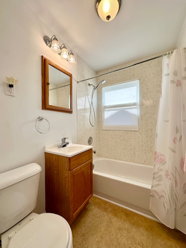 full bathroom featuring toilet, vanity, and shower / tub combo