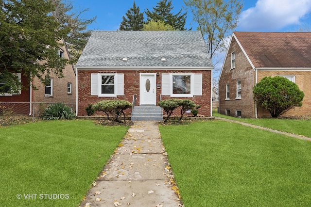 view of front of property with a front lawn