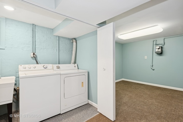 laundry area with independent washer and dryer