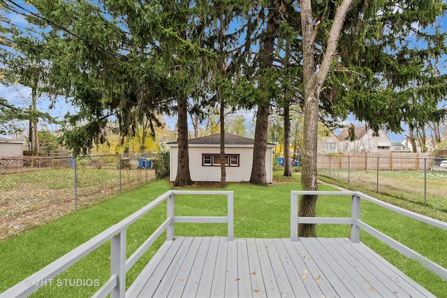 wooden terrace with a lawn