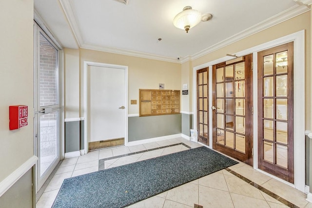 entryway with french doors, ornamental molding, and light tile patterned flooring