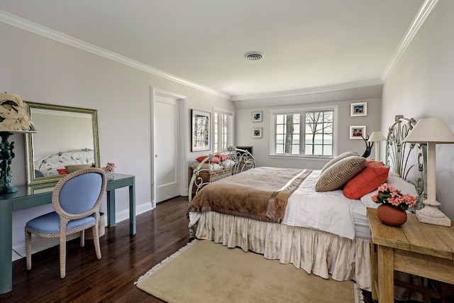 bedroom featuring ornamental molding and dark hardwood / wood-style flooring