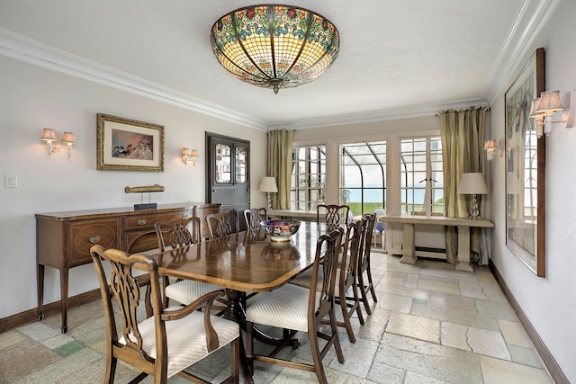 dining area featuring ornamental molding