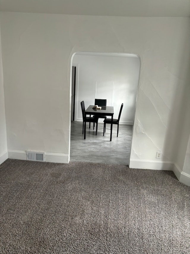 dining room featuring carpet flooring