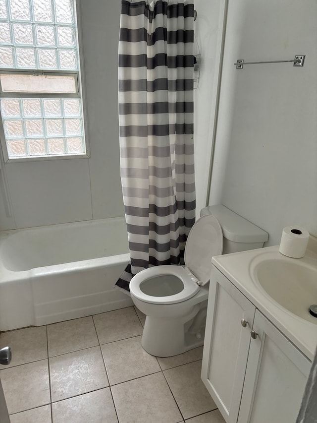 full bathroom featuring vanity, toilet, shower / tub combo, and tile patterned flooring