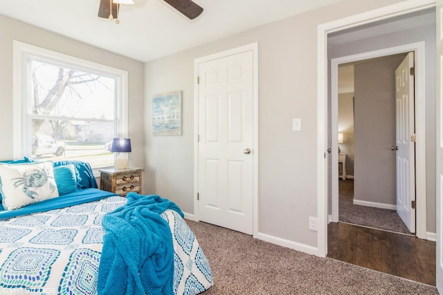 carpeted bedroom featuring ceiling fan