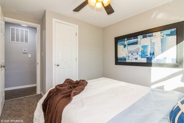 carpeted bedroom featuring ceiling fan