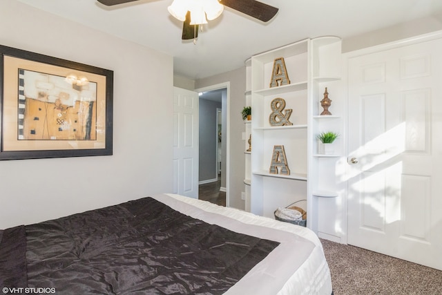 carpeted bedroom with ceiling fan