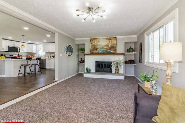 living room with crown molding and dark carpet