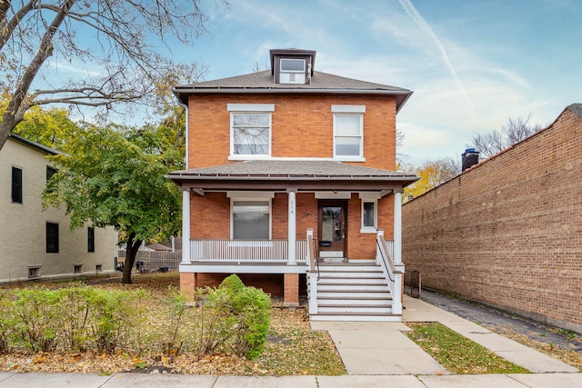 front of property featuring covered porch