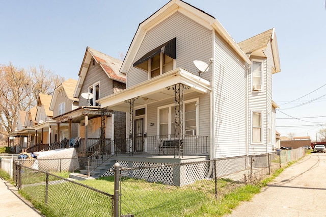 view of front of property with a front lawn and a porch