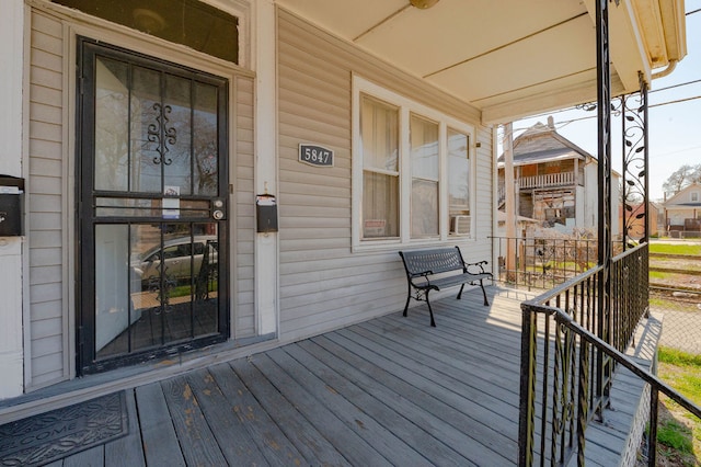 wooden deck with covered porch