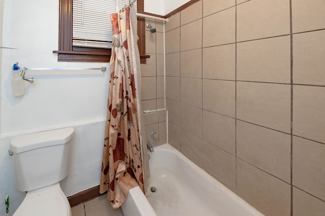 bathroom with toilet and shower / bathtub combination with curtain