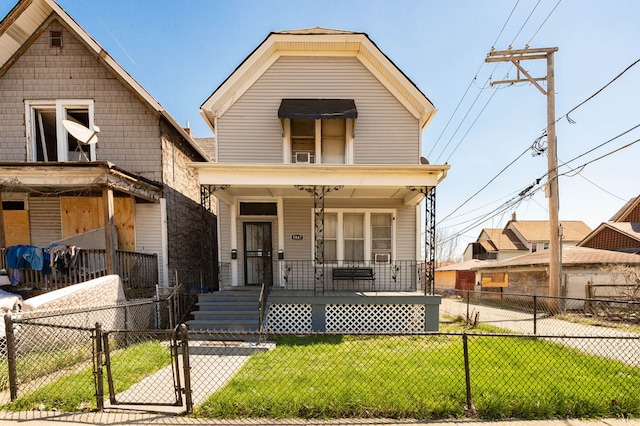 bungalow-style home with a front yard and a porch