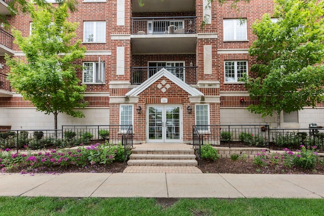 124 W Colfax St Unit 301, Palatine, IL 60067 - doorway to property featuring brick siding and a balcony