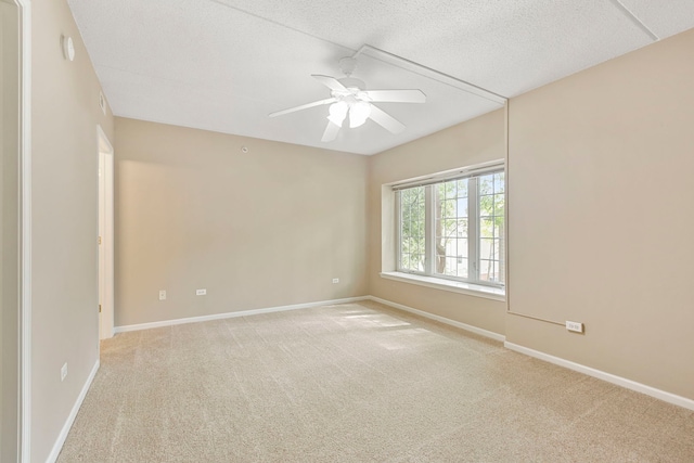 124 W Colfax St Unit 301, Palatine, IL 60067 - unfurnished room with light colored carpet, a ceiling fan, and a textured ceiling