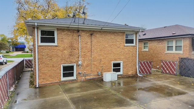 rear view of property with a patio area