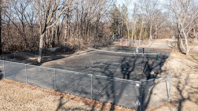 view of sport court with community basketball court and fence