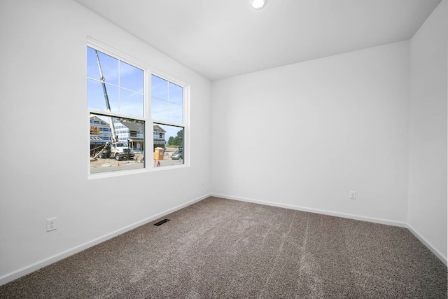 unfurnished room with carpet