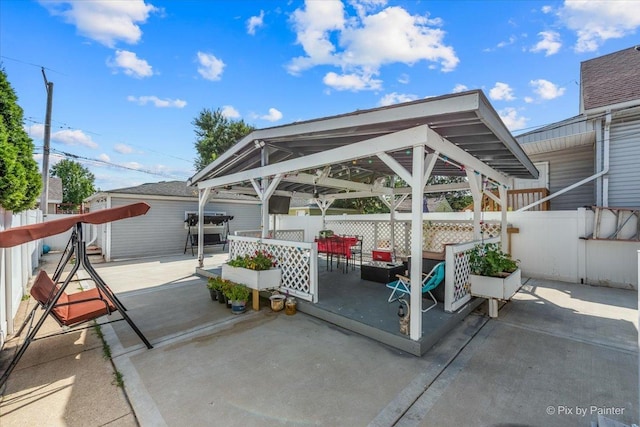 view of patio / terrace with a gazebo and fence