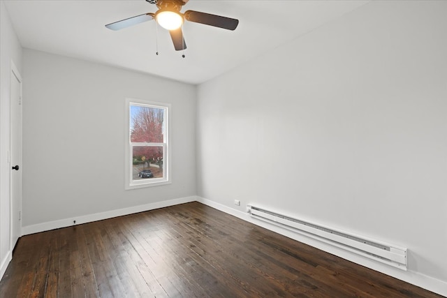 empty room with a baseboard heating unit, dark wood-type flooring, and ceiling fan