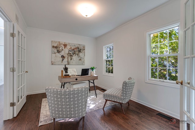 office area with dark hardwood / wood-style floors, crown molding, and french doors