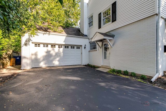 exterior space featuring a garage