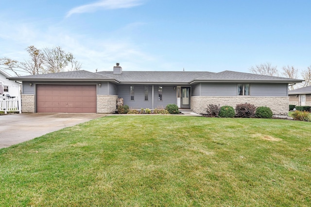 single story home featuring a front lawn and a garage