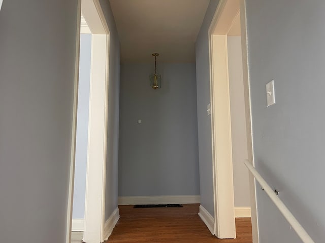 corridor featuring hardwood / wood-style flooring