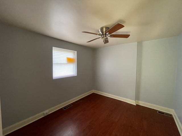 unfurnished room with ceiling fan and hardwood / wood-style floors