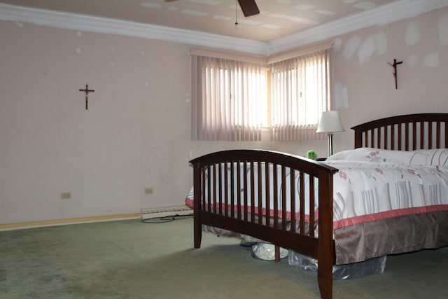 carpeted bedroom with ceiling fan and crown molding