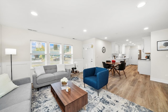 living room featuring light hardwood / wood-style flooring