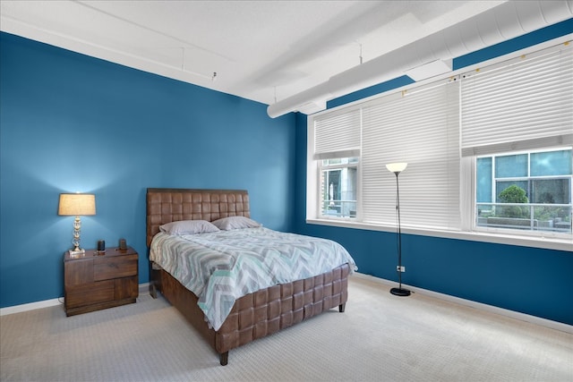 bedroom with light colored carpet