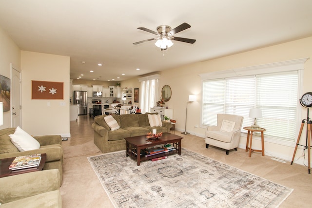 living room featuring ceiling fan