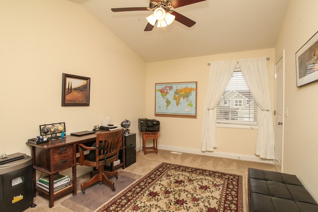 carpeted office featuring ceiling fan and vaulted ceiling